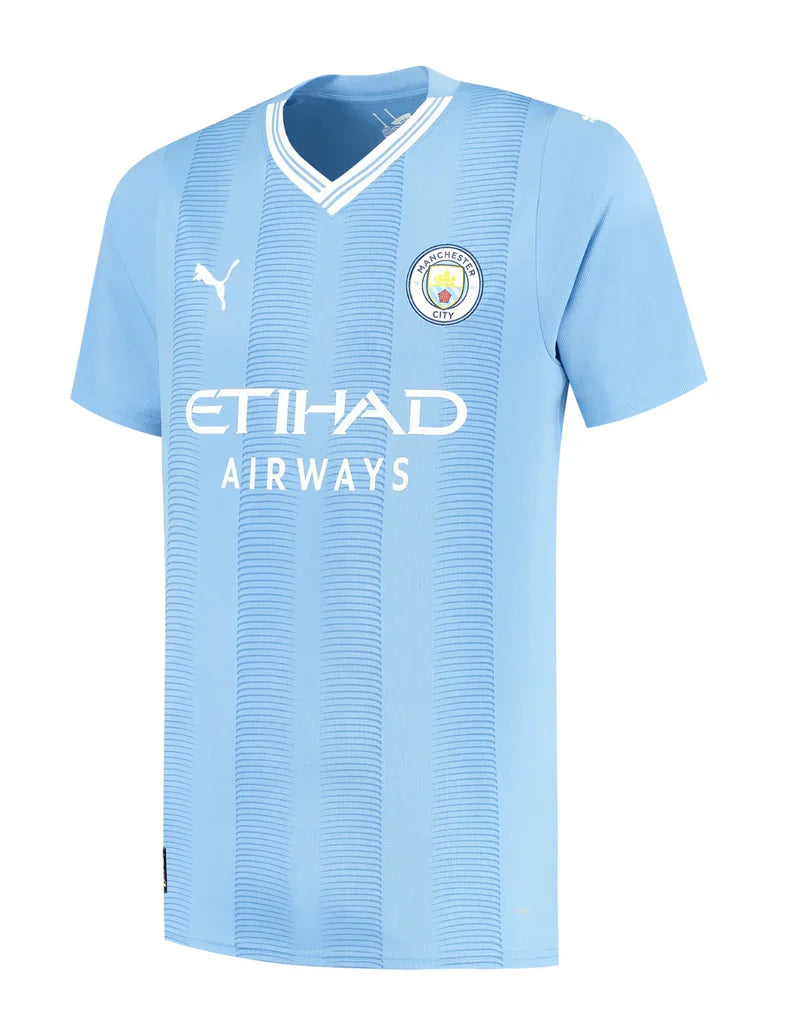 Camisola Manchester City I 23/24 - Azul e Branca